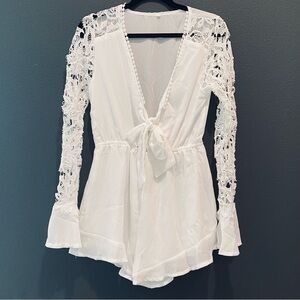 White romper shorts and top one piece, bow detail and lace sleeves, size medium